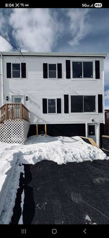 a view of a backyard of a house