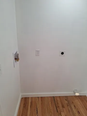 a view of small space with racks on the wall