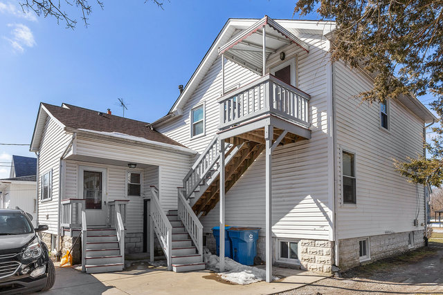 1431 Main Street Crete, IL 60417 - Photo 4 of 17 a view of a house with a patio