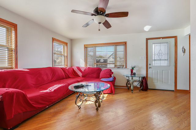 1431 Main Street Crete, IL 60417 - Photo 5 of 17 a living room with furniture and a window