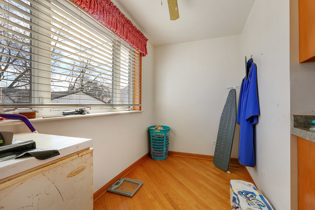 1431 Main Street Crete, IL 60417 - Photo 8 of 17 a bedroom with a bed and a window