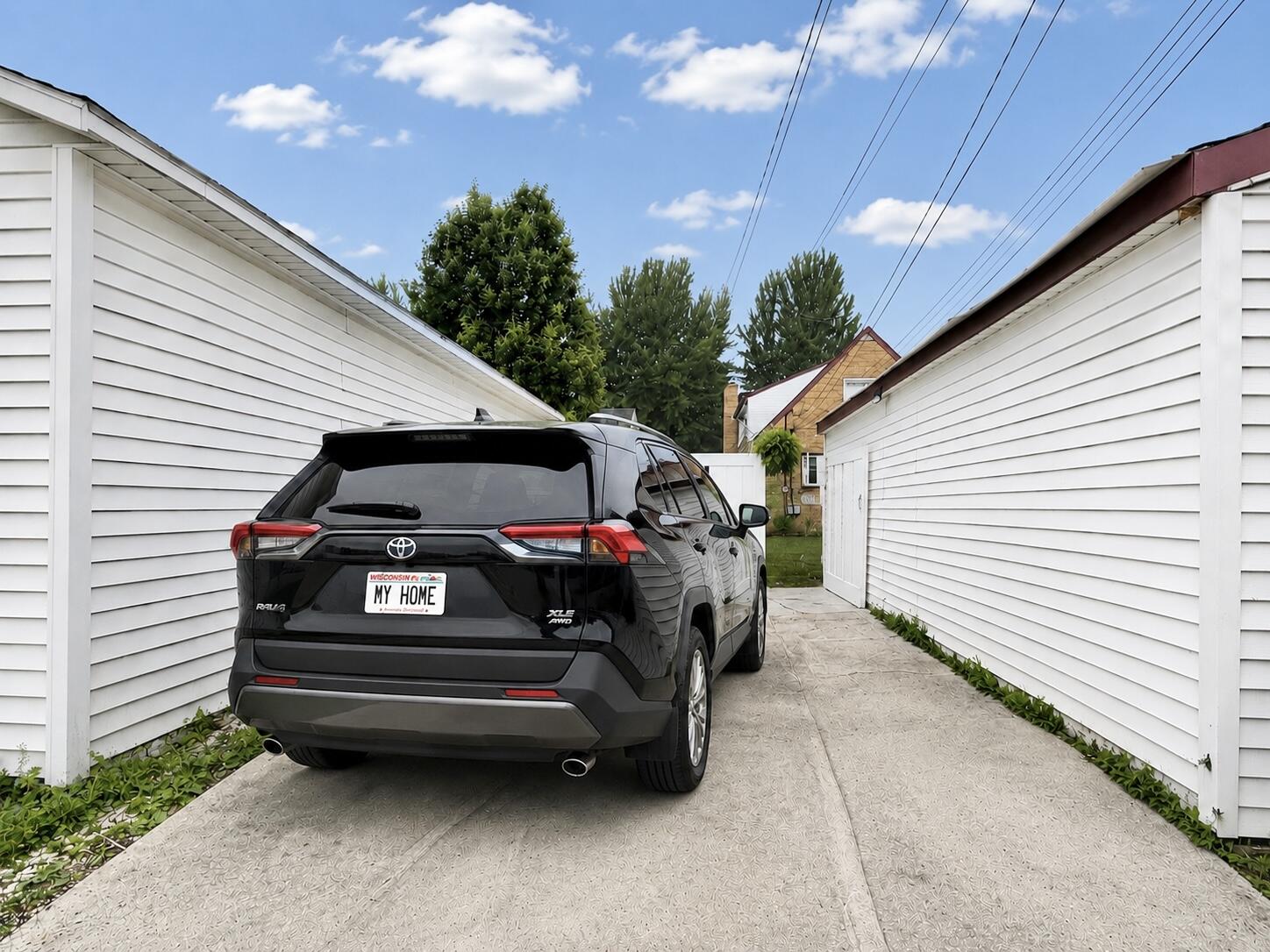 214 South 65th Street Milwaukee, WI 53214 - Photo 22 of 29 Generous size parking pad. Some photos may include virtually staging and or digital enhancements.