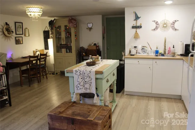 a view of a backyard with sitting area