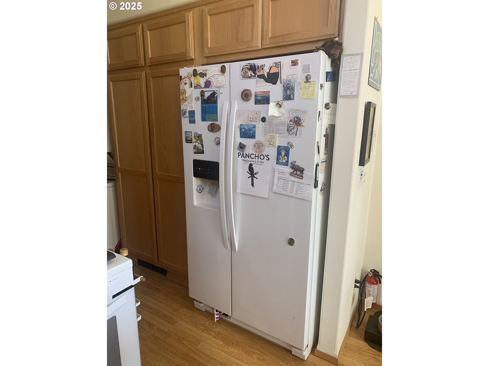 19921 Whaleshead Road, Unit B2 Brookings, OR 97415 - Photo 12 of 41 a view of walk in closet with wooden floor