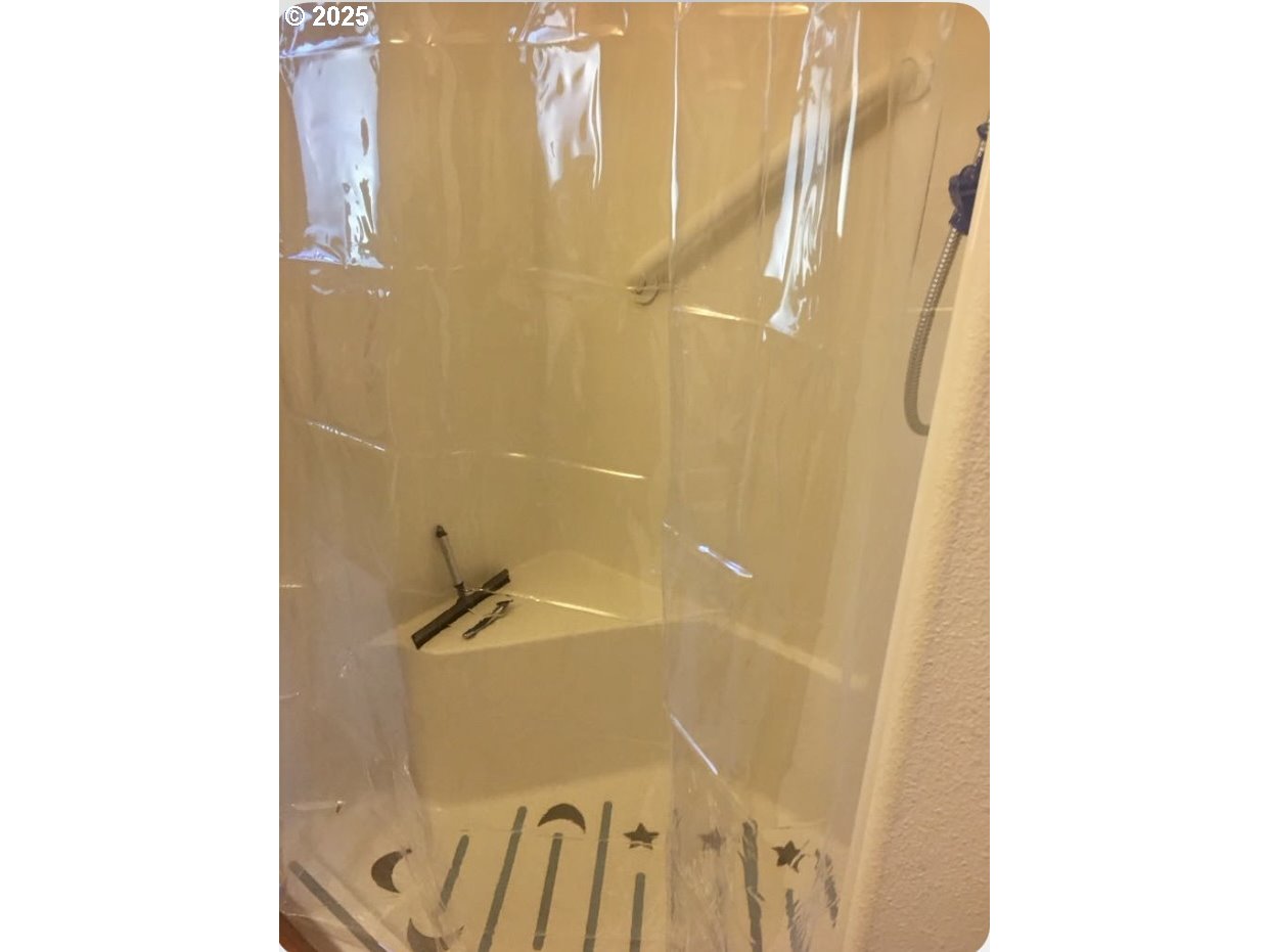 19921 Whaleshead Road, Unit B2 Brookings, OR 97415 - Photo 17 of 41 a bathroom with a shower