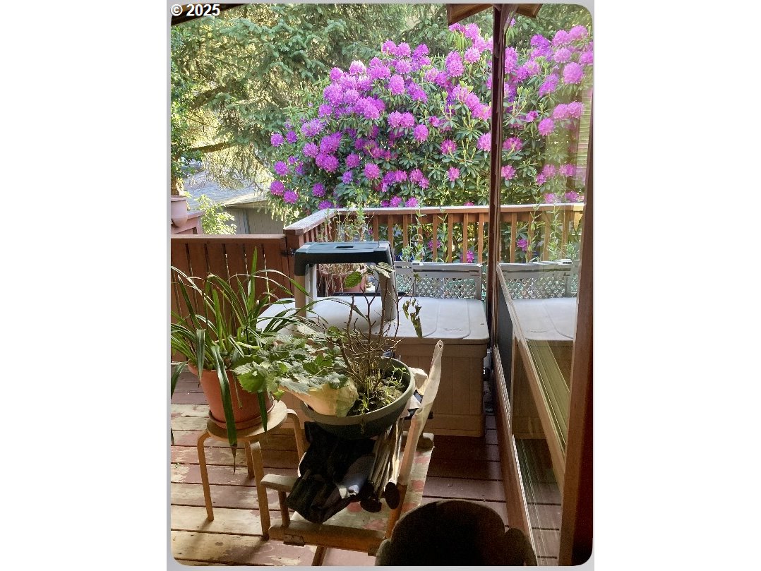 19921 Whaleshead Road, Unit B2 Brookings, OR 97415 - Photo 33 of 41 a dining room with furniture and wooden floor