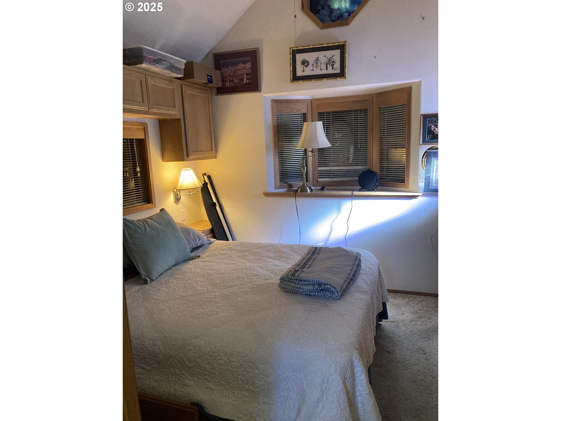 19921 Whaleshead Road, Unit B2 Brookings, OR 97415 - Photo 35 of 41 a living room with furniture and a fireplace