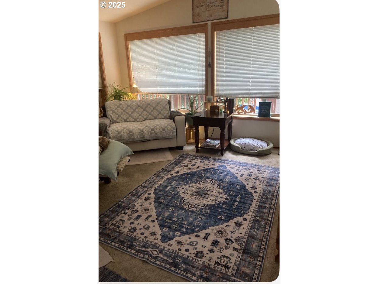 19921 Whaleshead Road, Unit B2 Brookings, OR 97415 - Photo 5 of 41 a living room with furniture and a rug