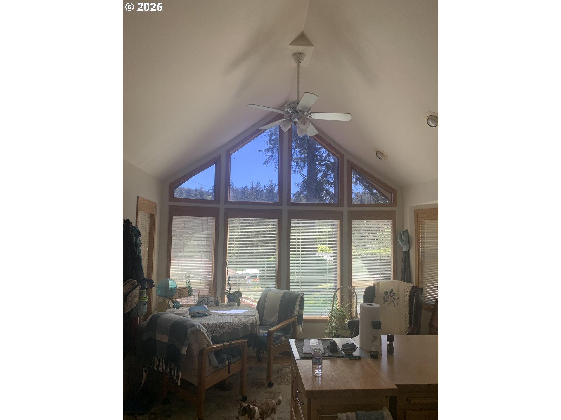 19921 Whaleshead Road, Unit B2 Brookings, OR 97415 - Photo 9 of 41 a living room with furniture and a window