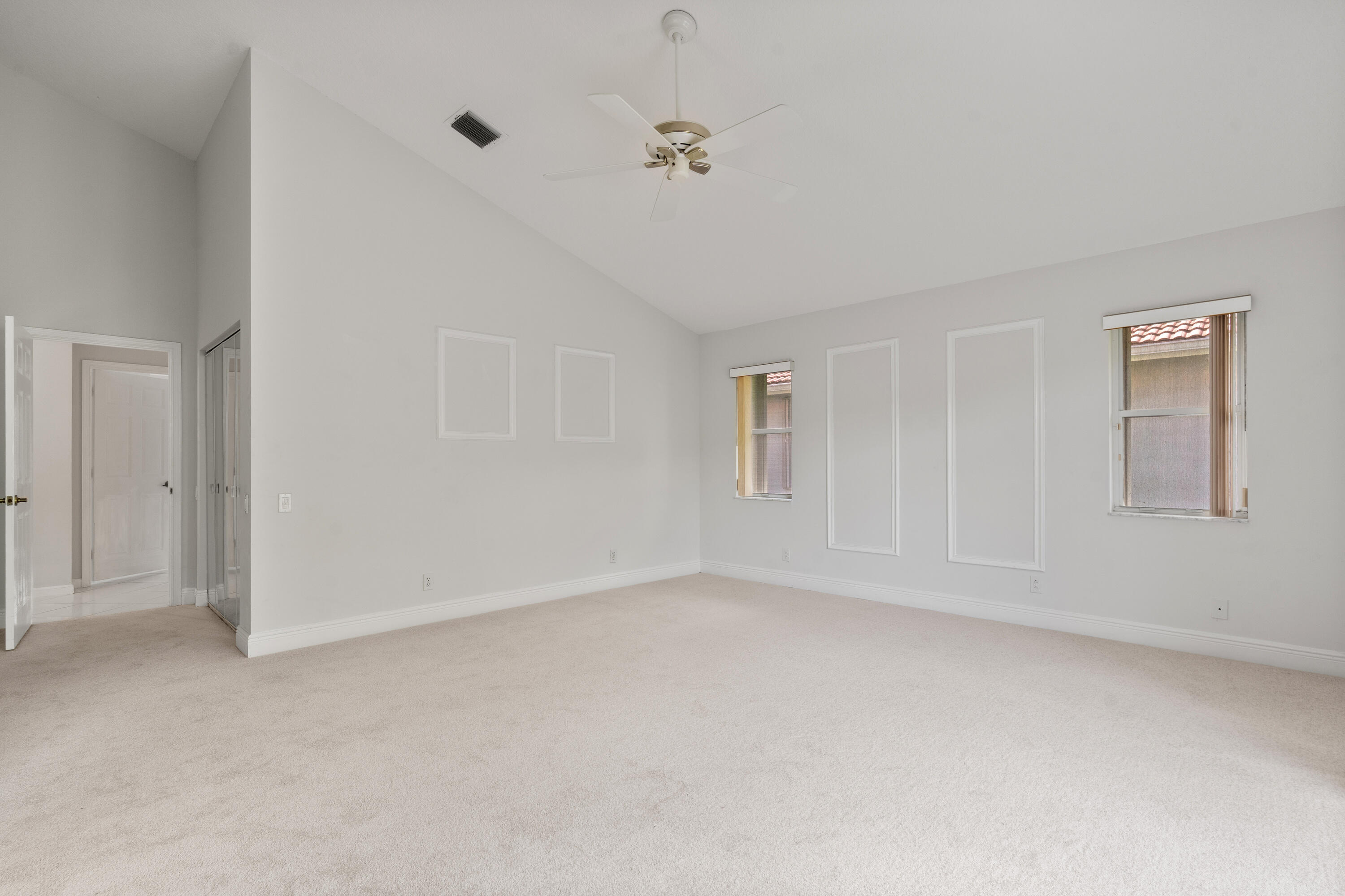 7291 Falls Road East Boynton Beach, FL 33437 - Photo 23 of 26 a view of an empty room with a window