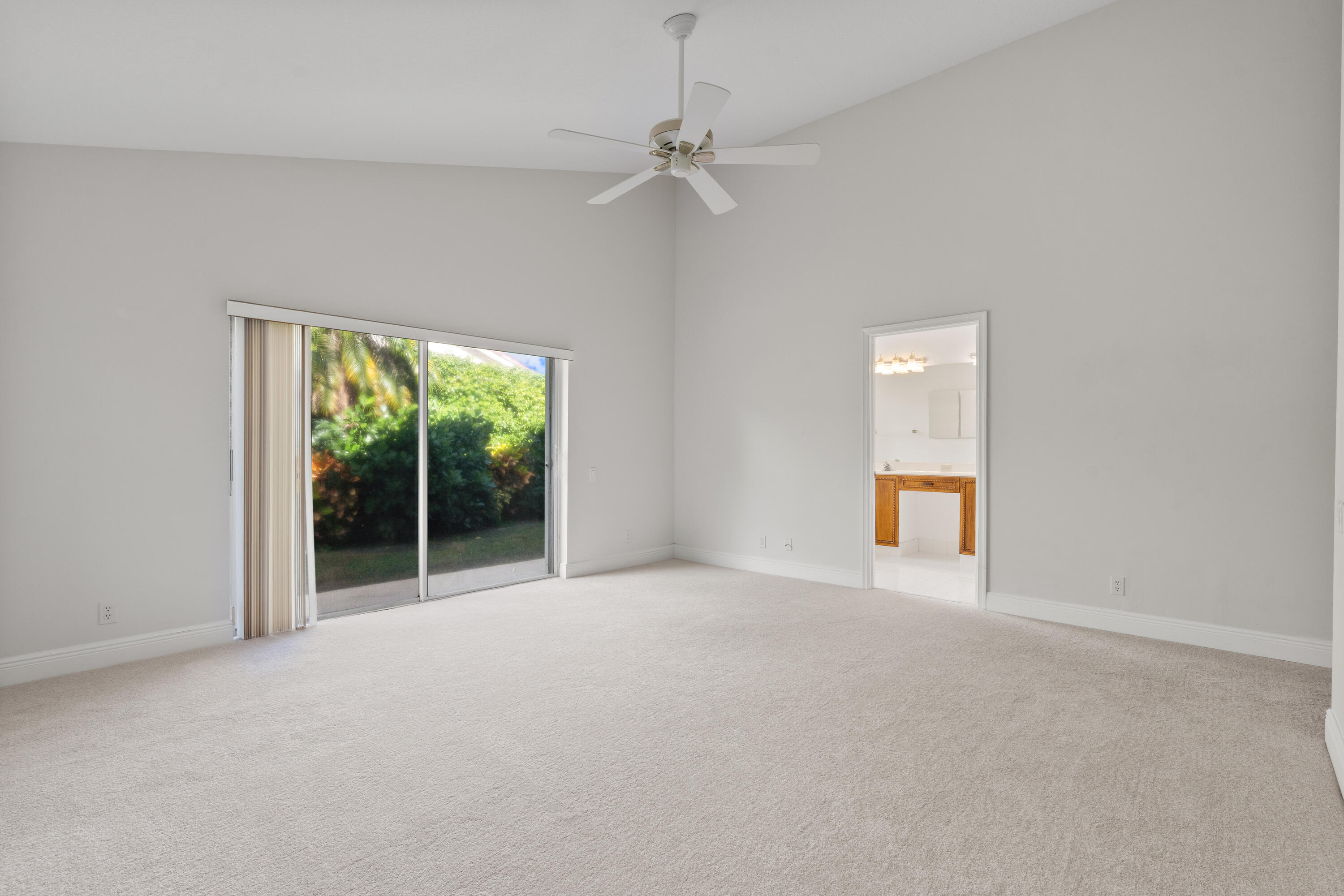 7291 Falls Road East Boynton Beach, FL 33437 - Photo 24 of 26 a view of an empty room with a window
