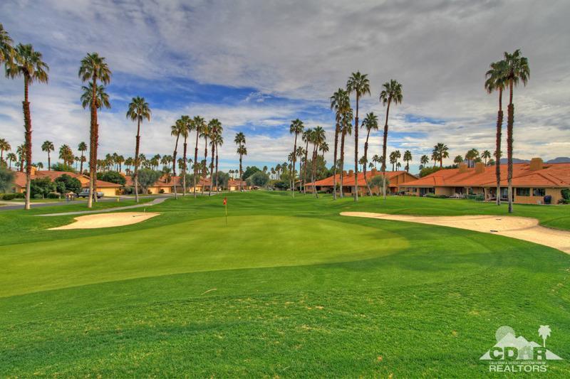 52 Maximo Way Palm Desert, CA 92260 - Photo 1 of 20 a view of a park with palm trees