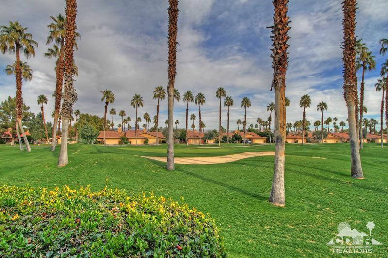 52 Maximo Way Palm Desert, CA 92260 - Photo 17 of 20 a view of a park with palm trees