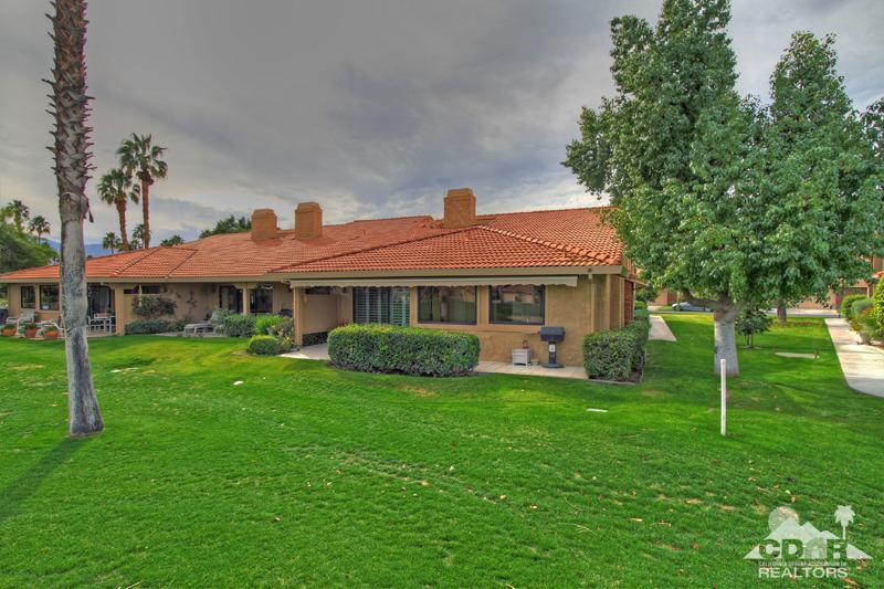 52 Maximo Way Palm Desert, CA 92260 - Photo 18 of 20 a front view of a house with garden