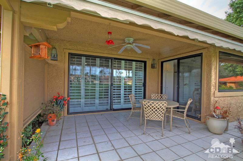 52 Maximo Way Palm Desert, CA 92260 - Photo 19 of 20 a front view of a house with outdoor seating