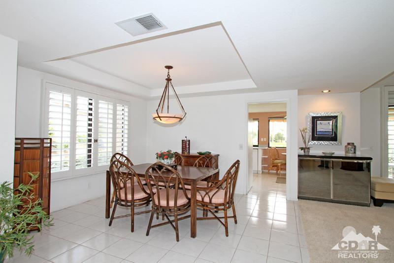 52 Maximo Way Palm Desert, CA 92260 - Photo 5 of 20 a view of a dining room with furniture