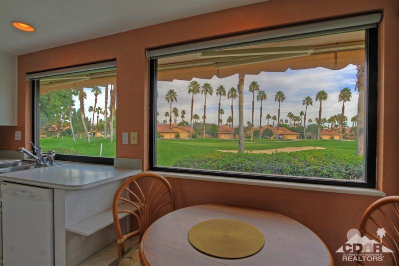 52 Maximo Way Palm Desert, CA 92260 - Photo 9 of 20 a room with furniture and a large window