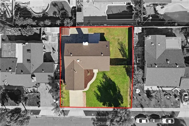 an aerial view of houses with outdoor space