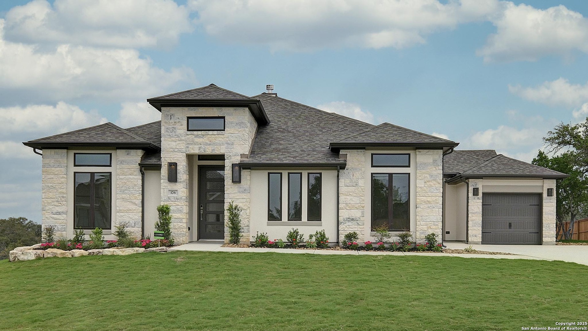 176 Violet Way Castroville, TX 78009 - Photo 1 of 1 front view of a house with a yard