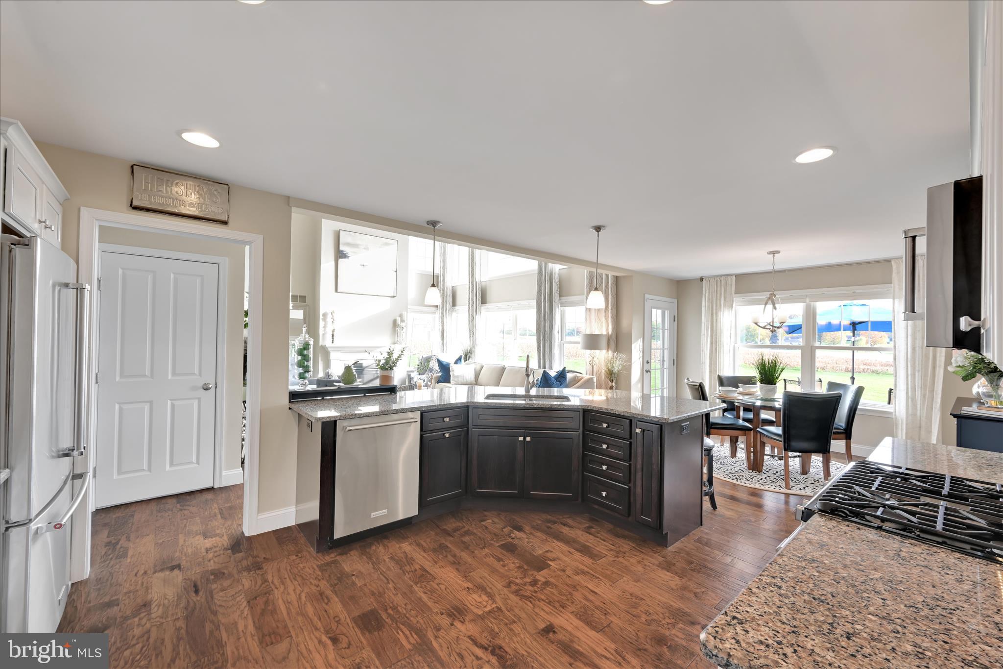 495 South Mill Street Lebanon, PA 17042 - Photo 12 of 54 a kitchen with stainless steel appliances granite countertop a stove and a refrigerator