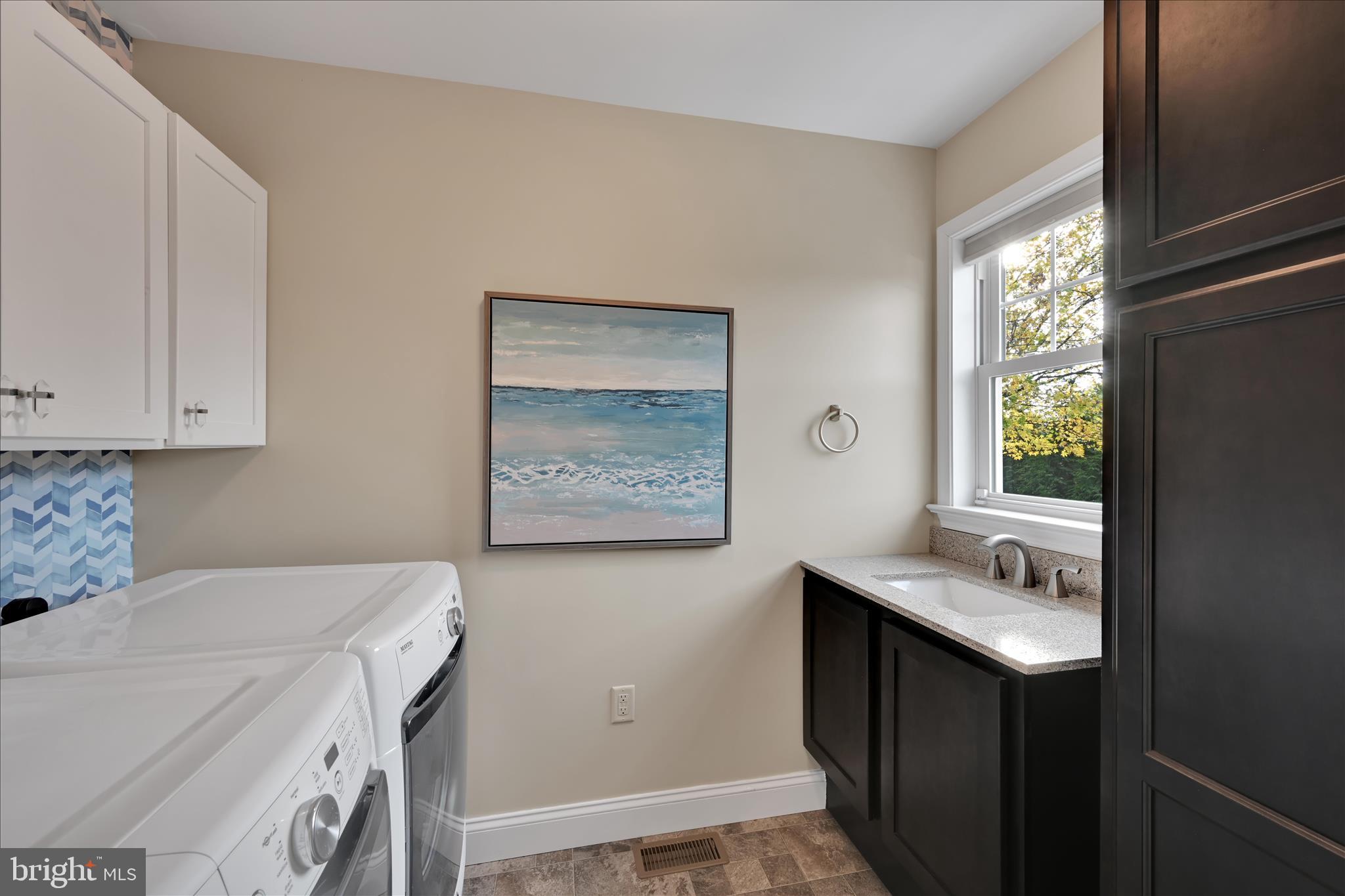 495 South Mill Street Lebanon, PA 17042 - Photo 14 of 54 a utility room with a window dryer and washer