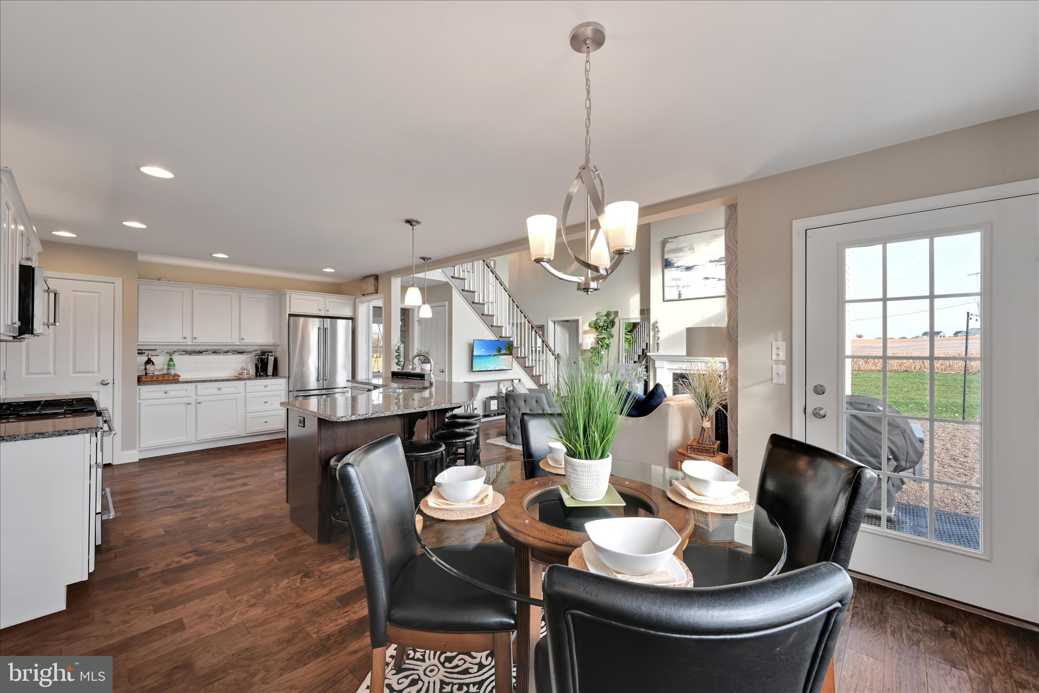 495 South Mill Street Lebanon, PA 17042 - Photo 16 of 54 a dining room with furniture a chandelier and wooden floor