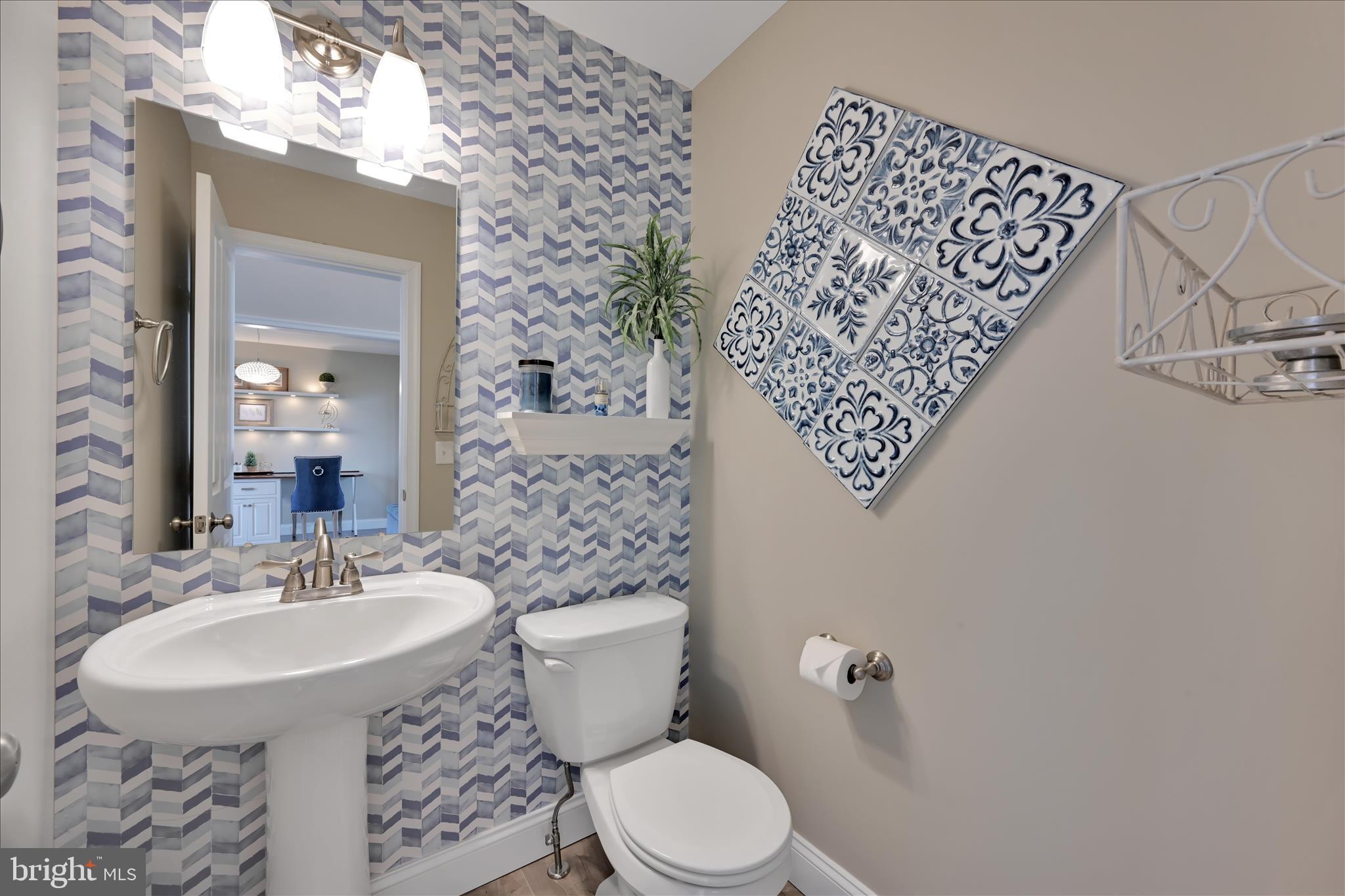 495 South Mill Street Lebanon, PA 17042 - Photo 20 of 54 a bathroom with a sink toilet and a mirror