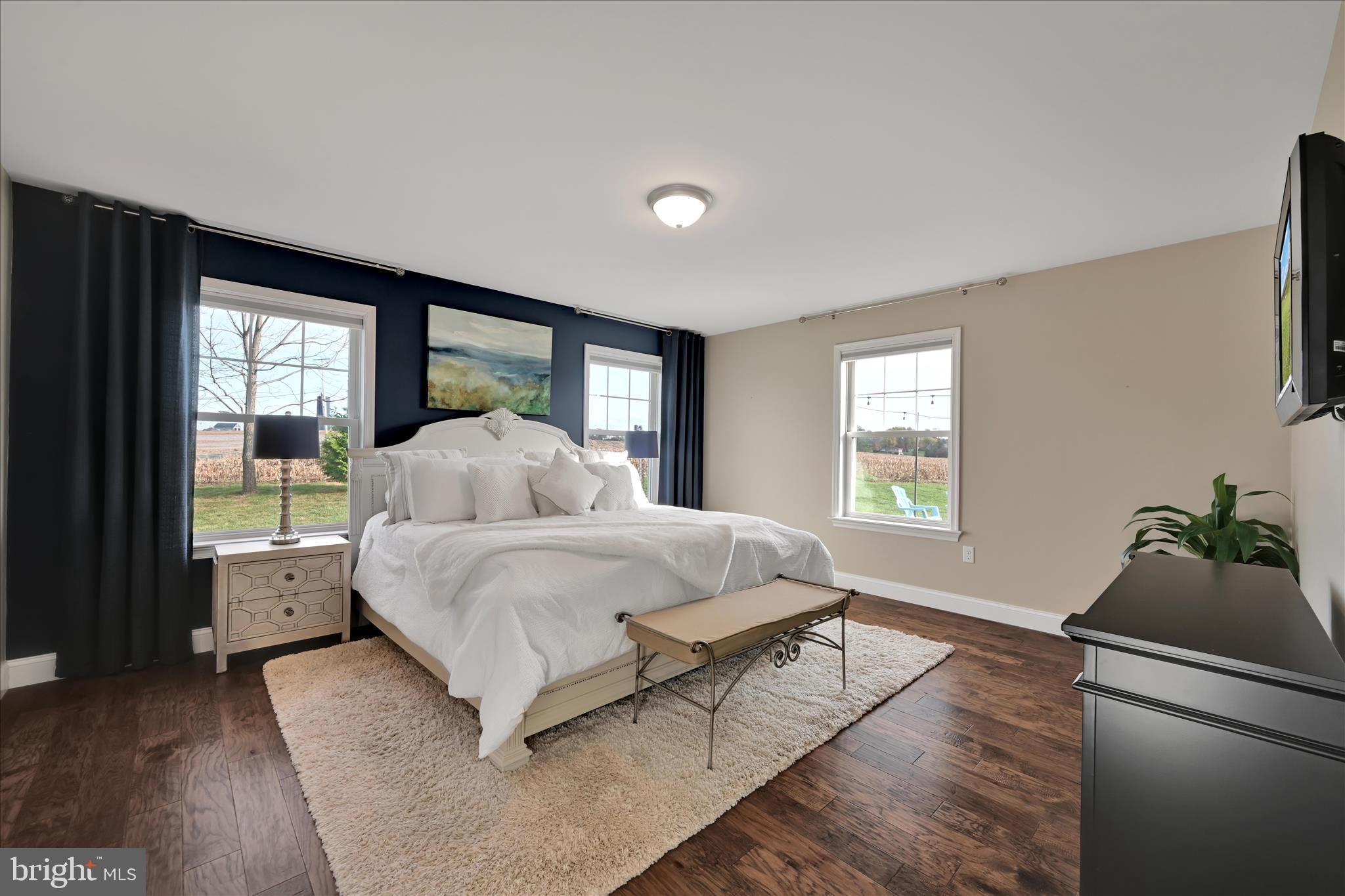495 South Mill Street Lebanon, PA 17042 - Photo 21 of 54 a spacious bedroom with a bed and large windows