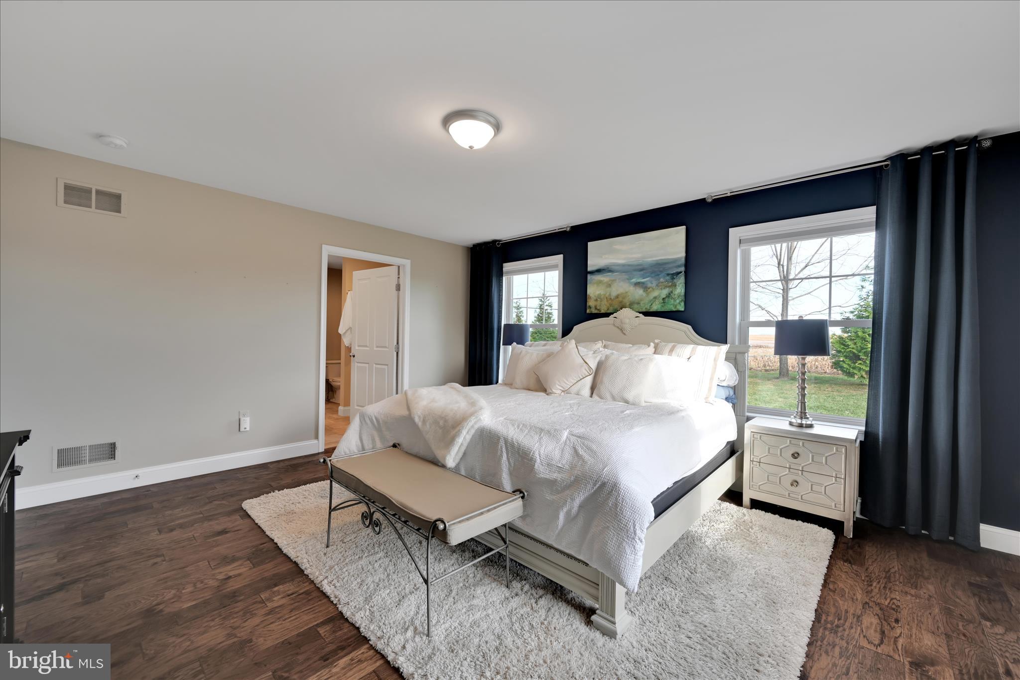495 South Mill Street Lebanon, PA 17042 - Photo 22 of 54 a bedroom with a bed lamp and a large window