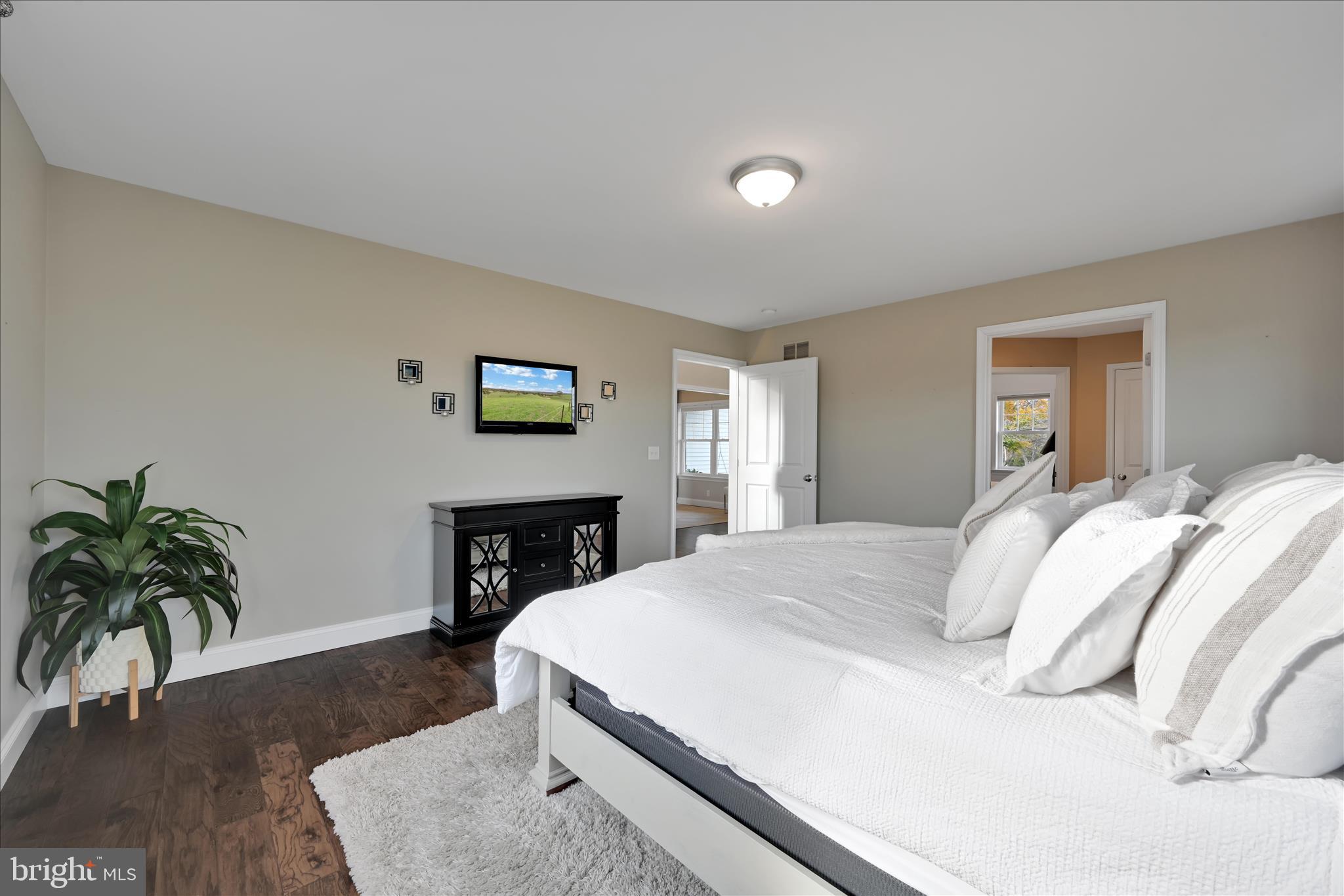 495 South Mill Street Lebanon, PA 17042 - Photo 23 of 54 a bedroom with a bed and a potted plant