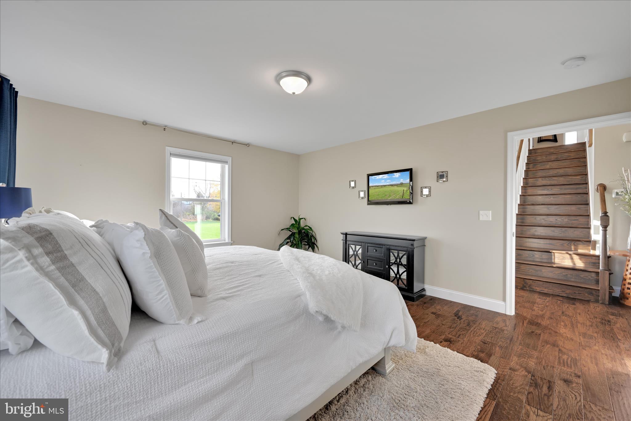 495 South Mill Street Lebanon, PA 17042 - Photo 24 of 54 a bedroom with a bed and dresser with mirror