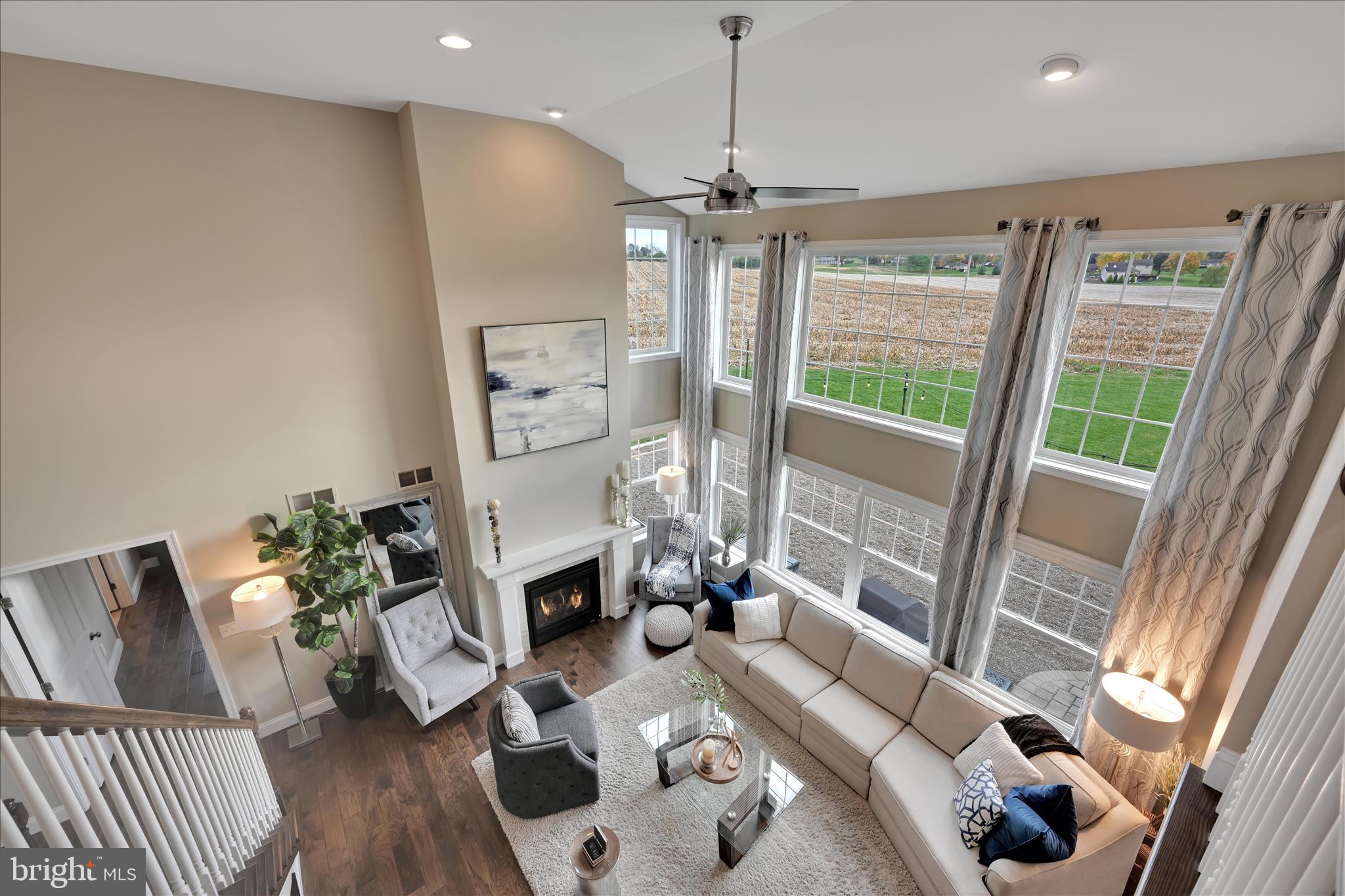 495 South Mill Street Lebanon, PA 17042 - Photo 28 of 54 a living room with furniture a floor to ceiling window and wooden floor