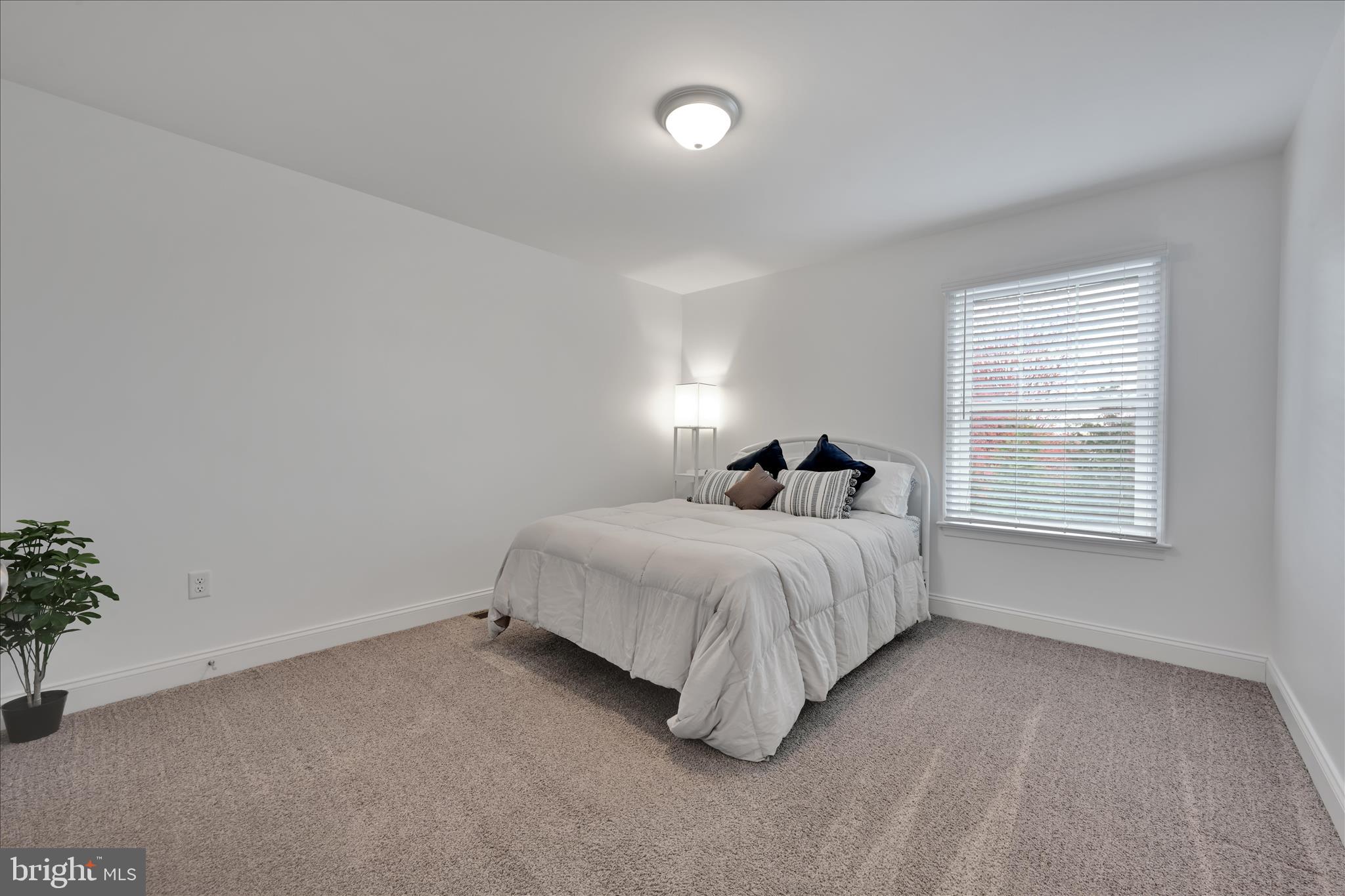 495 South Mill Street Lebanon, PA 17042 - Photo 33 of 54 a spacious bedroom with a bed and a window