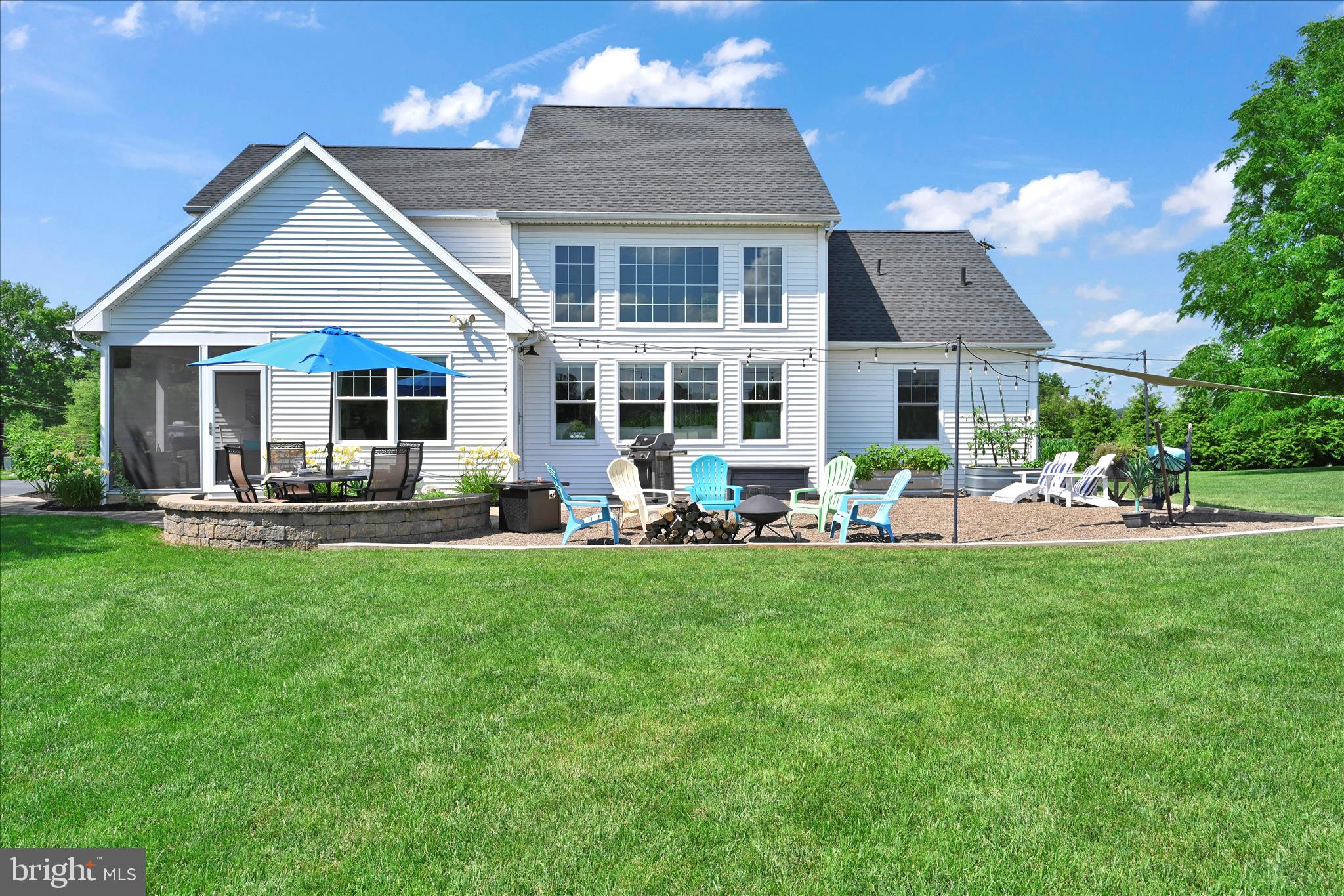 495 South Mill Street Lebanon, PA 17042 - Photo 38 of 54 a front view of a house with a yard patio and fire pit