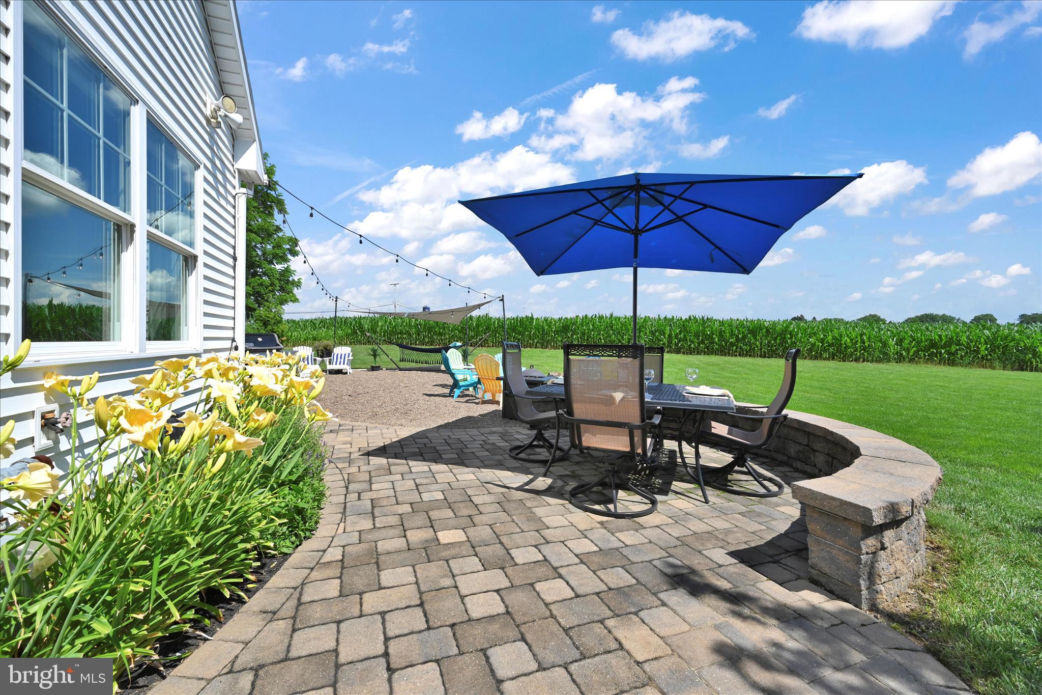 495 South Mill Street Lebanon, PA 17042 - Photo 39 of 54 a view of a patio with a table and chairs under an umbrella