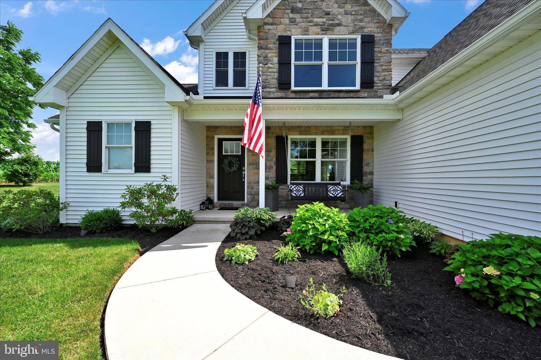 495 South Mill Street Lebanon, PA 17042 - Photo 4 of 54 a view of a house with potted plants and a table and chairs