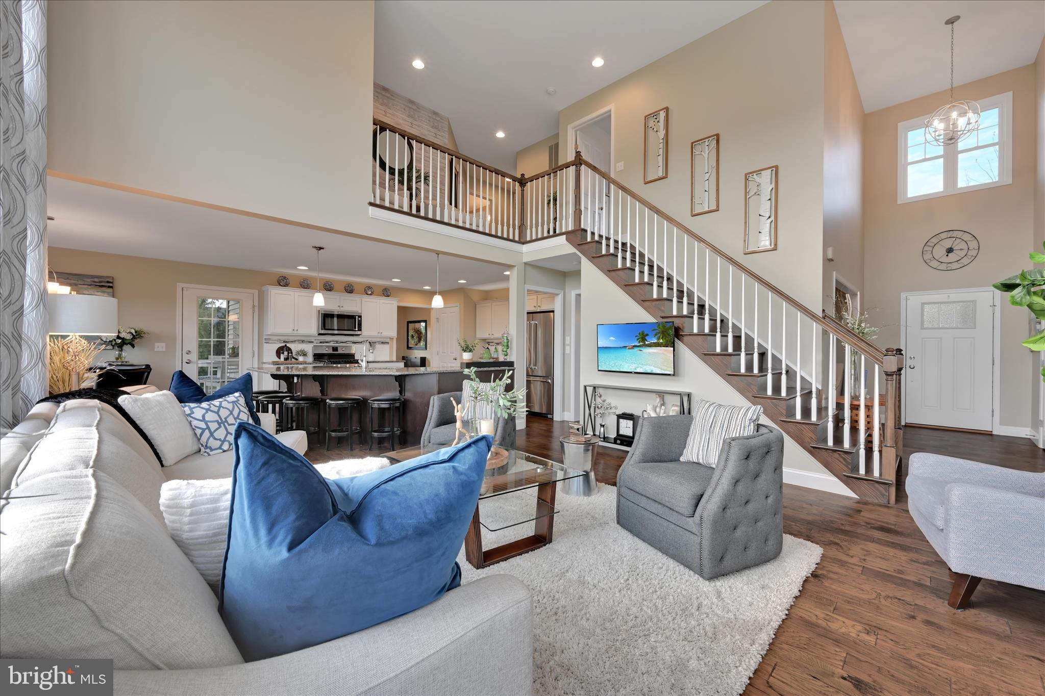 495 South Mill Street Lebanon, PA 17042 - Photo 7 of 54 a living room with furniture or couches and a dining table with wooden floor