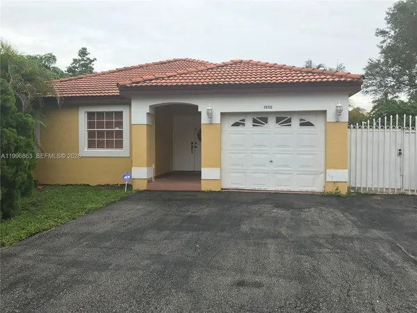 $599,900 | 19712 Northwest 82nd Place, Hialeah, FL 33015