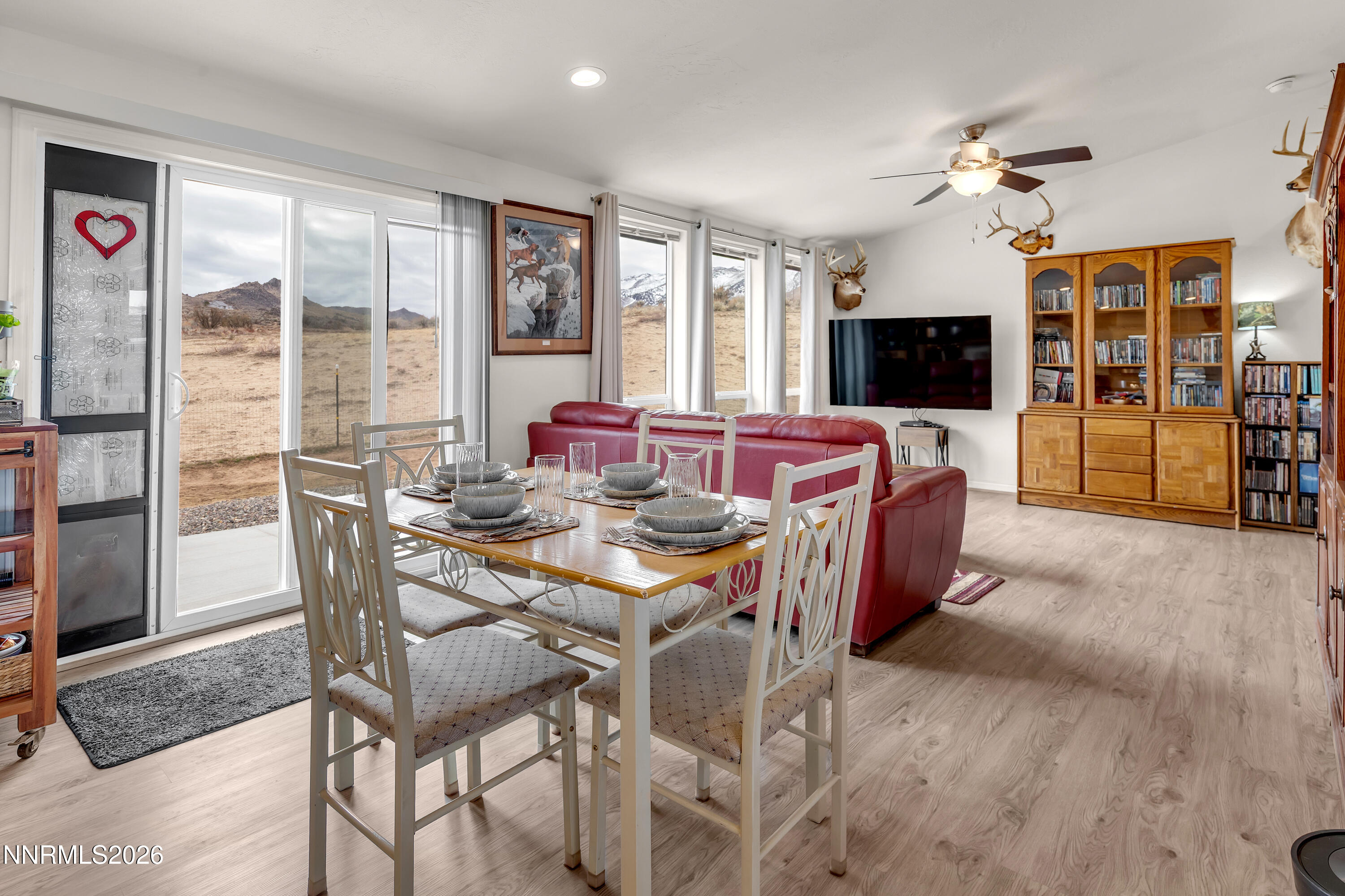 105 Arabian Way Reno, NV 89508 - Photo 13 of 40 a view of a dining room with furniture window and wooden floor