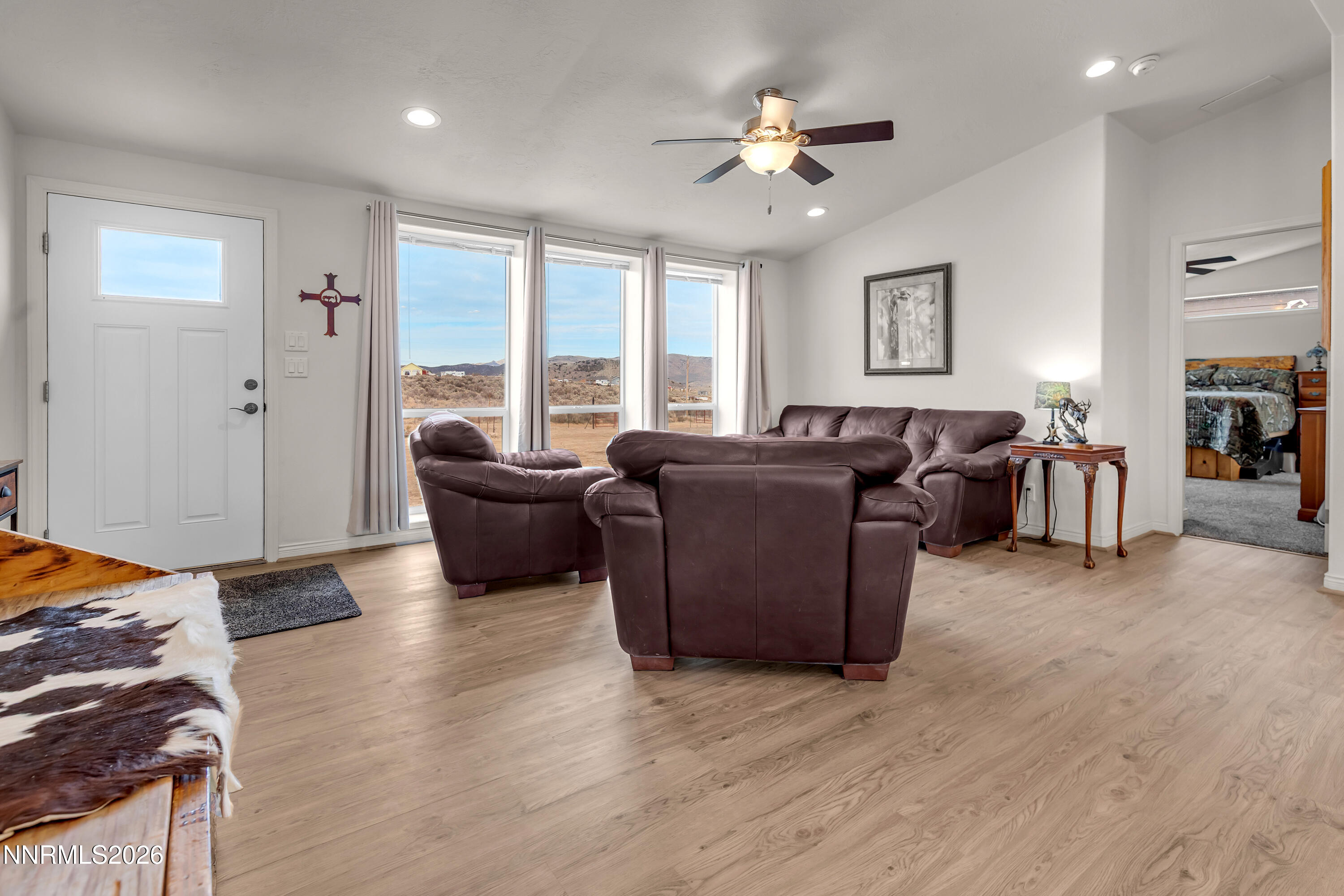 105 Arabian Way Reno, NV 89508 - Photo 7 of 40 a living room with furniture and a large window