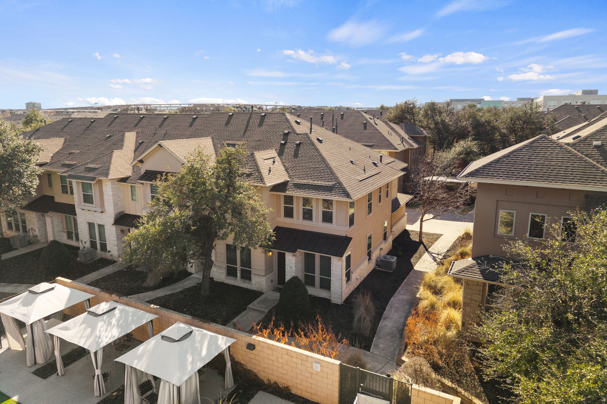 13800 Lyndhurst Street, Unit 326 Austin, TX 78717 - Photo 35 of 39 aerial view of a house with a yard