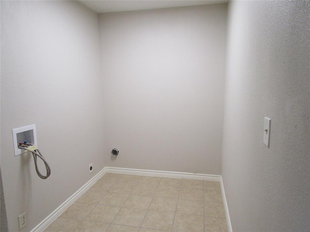 7128 Clemson Drive Dallas, TX 75214 - Photo 8 of 10 a view of a small space