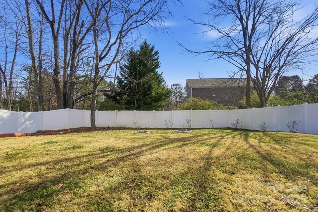 a view of a swimming pool with an outdoor space