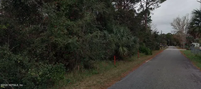 a view of a street with a trees