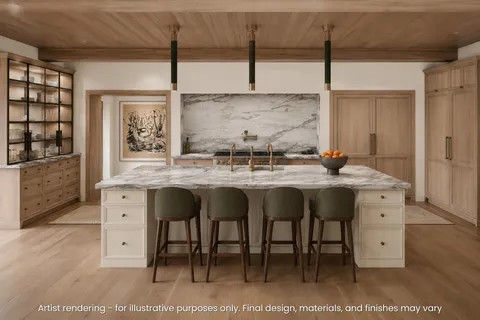 a kitchen with stainless steel appliances granite countertop a sink and a refrigerator