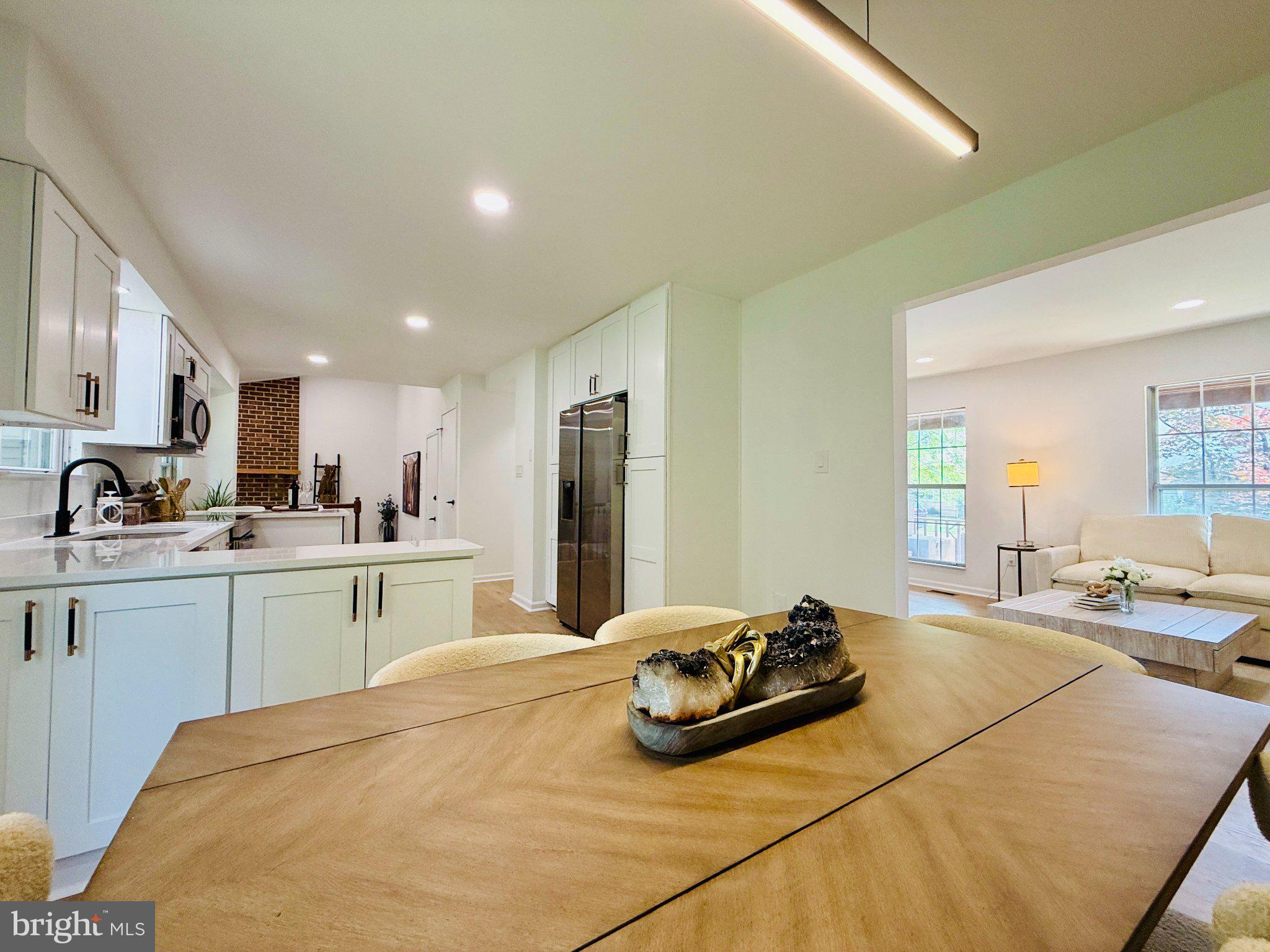 815 Whitehall Street Silver Spring, MD 20901 - Photo 9 of 39 Modern kitchen with open layout charm.