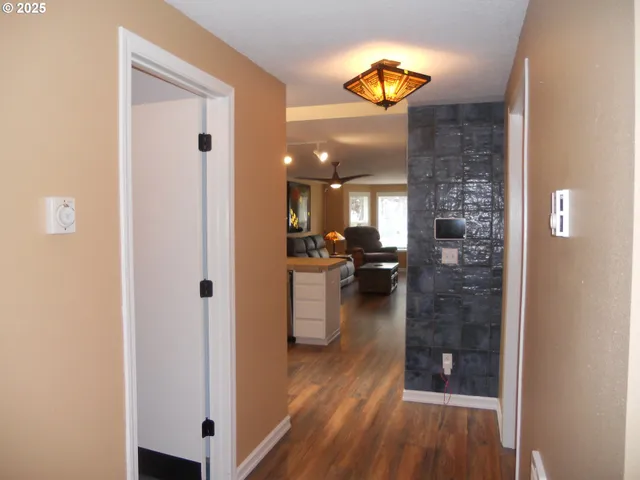 a view of a kitchen from the hallway