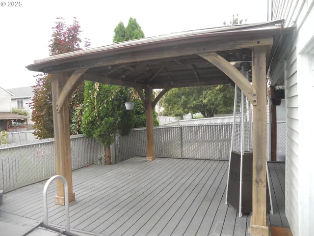 a view of balcony with wooden floor