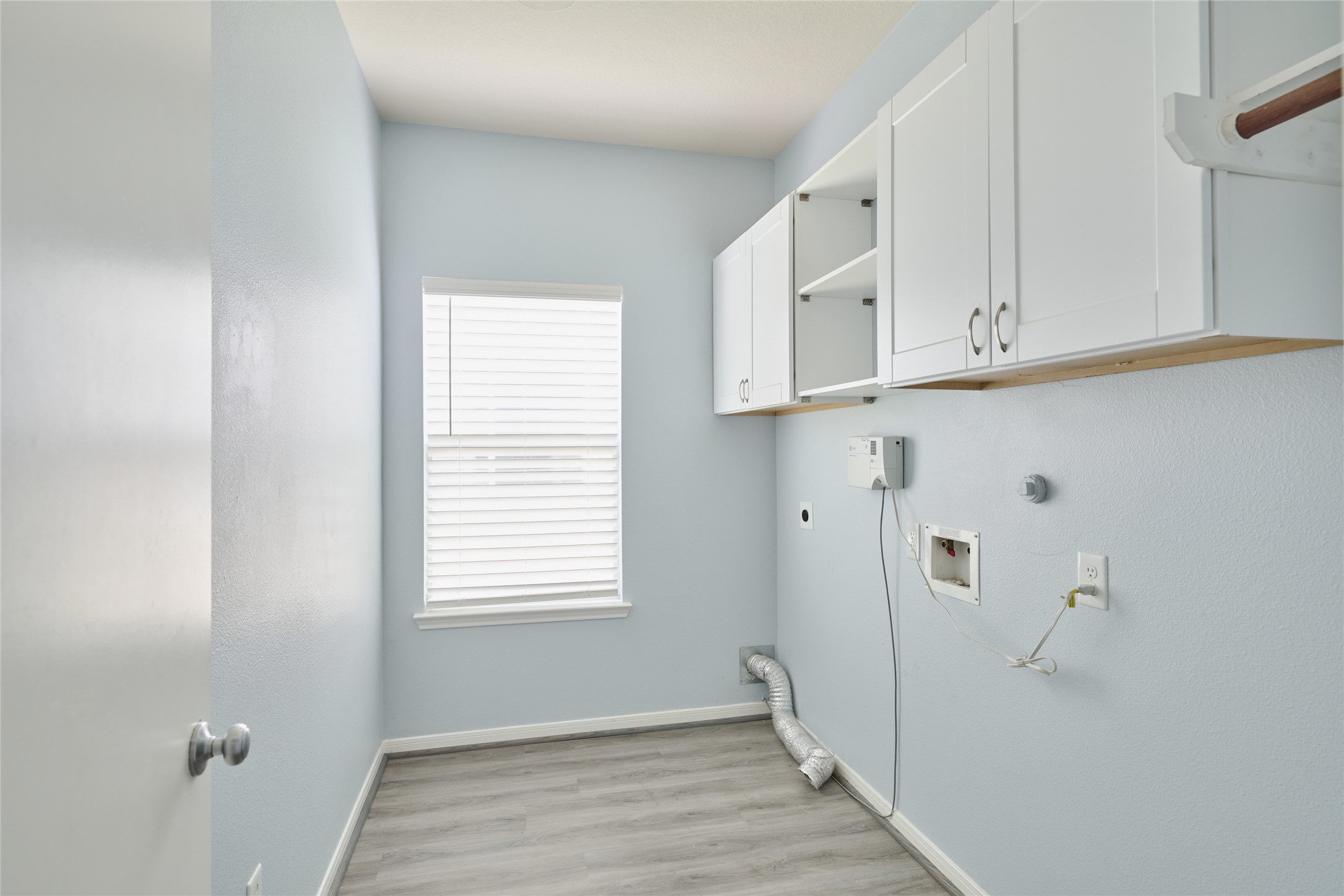 21718 Grassy Hill Lane Spring, TX 77388 - Photo 20 of 34 Laundry room with cabinets