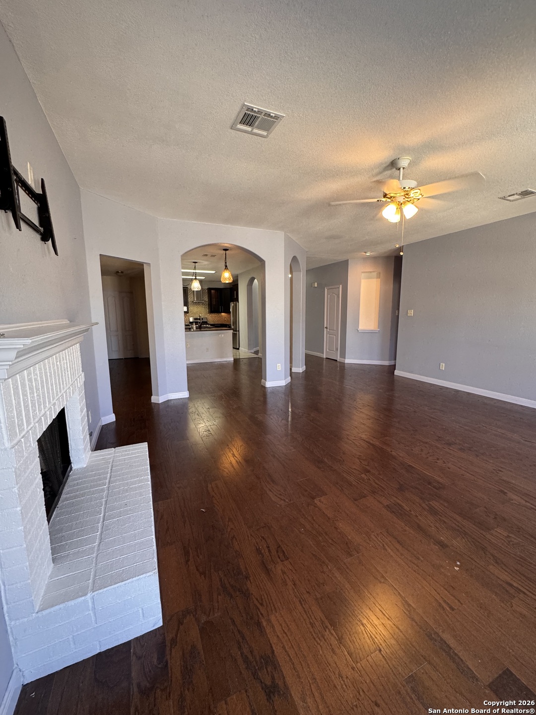 3836 Laurel Ridge Drive Round Rock, TX 78665 - Photo 16 of 40 a living room with furniture and a fireplace